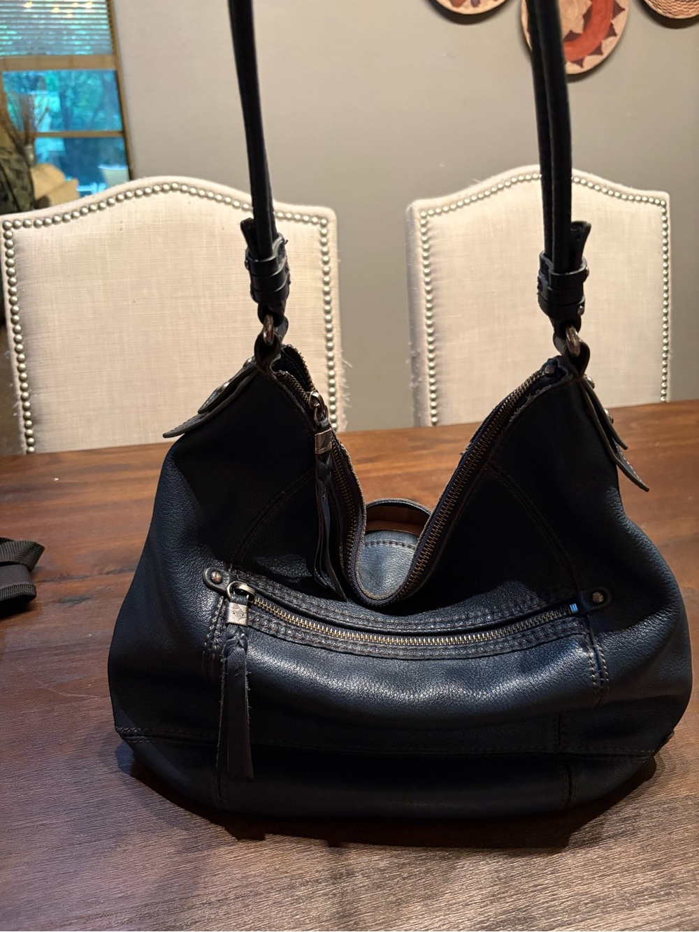 the Sak Sequoia Women's Classic Leather Shoulder Bag in Dark Blue